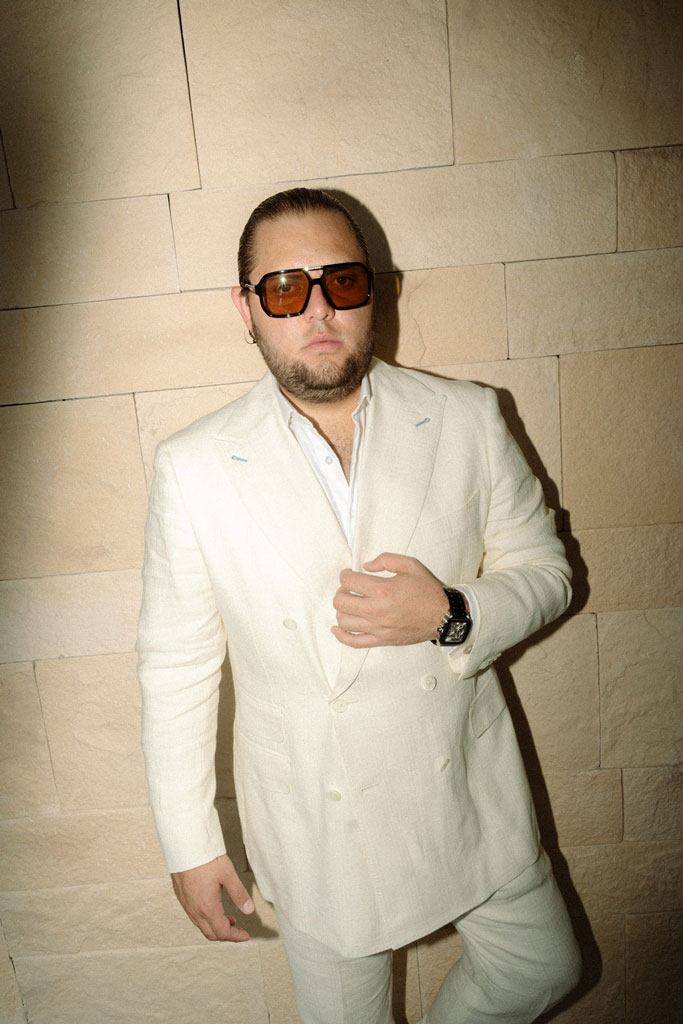 Editorial groom portrait in Cancun, modern luxury destination wedding photography