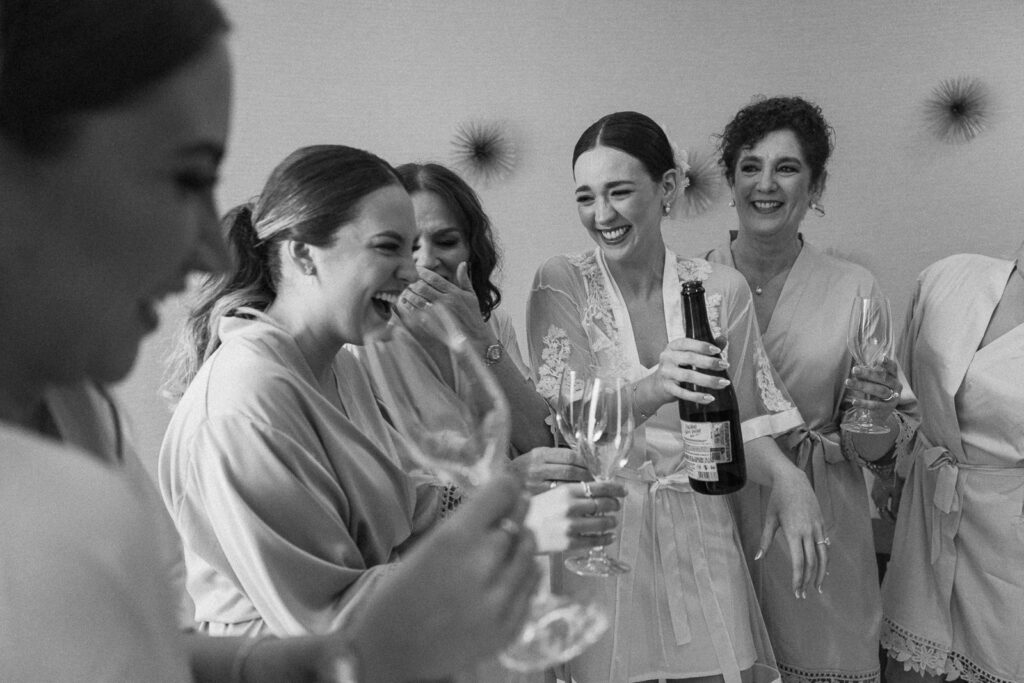 bridesmaids toast getting ready wedding morning