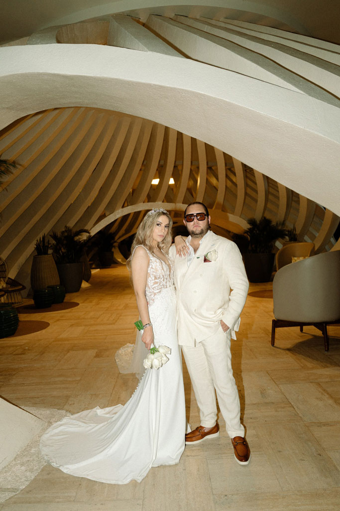 Real wedding couple portrait at Grand Palladium Costa Mujeres Cancun, editorial destination wedding photography by Casandra Films