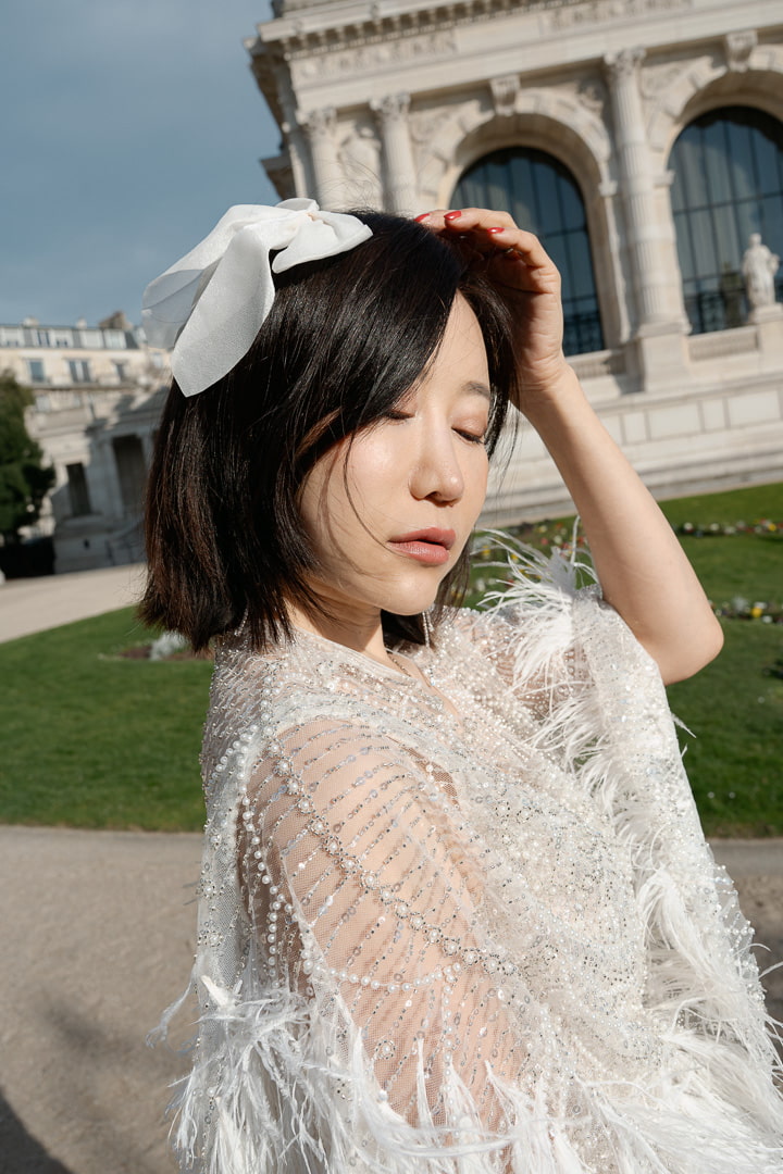 Editorial fashion portrait of Asian bride in Paris, luxury destination wedding photographer Cancun Mexico